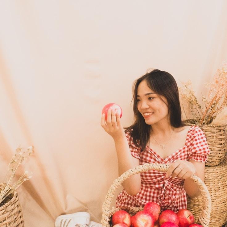 Kaveri Mehta, Lead Design Curator at Strategic Growth Plan, reviewing corporate floral arrangements